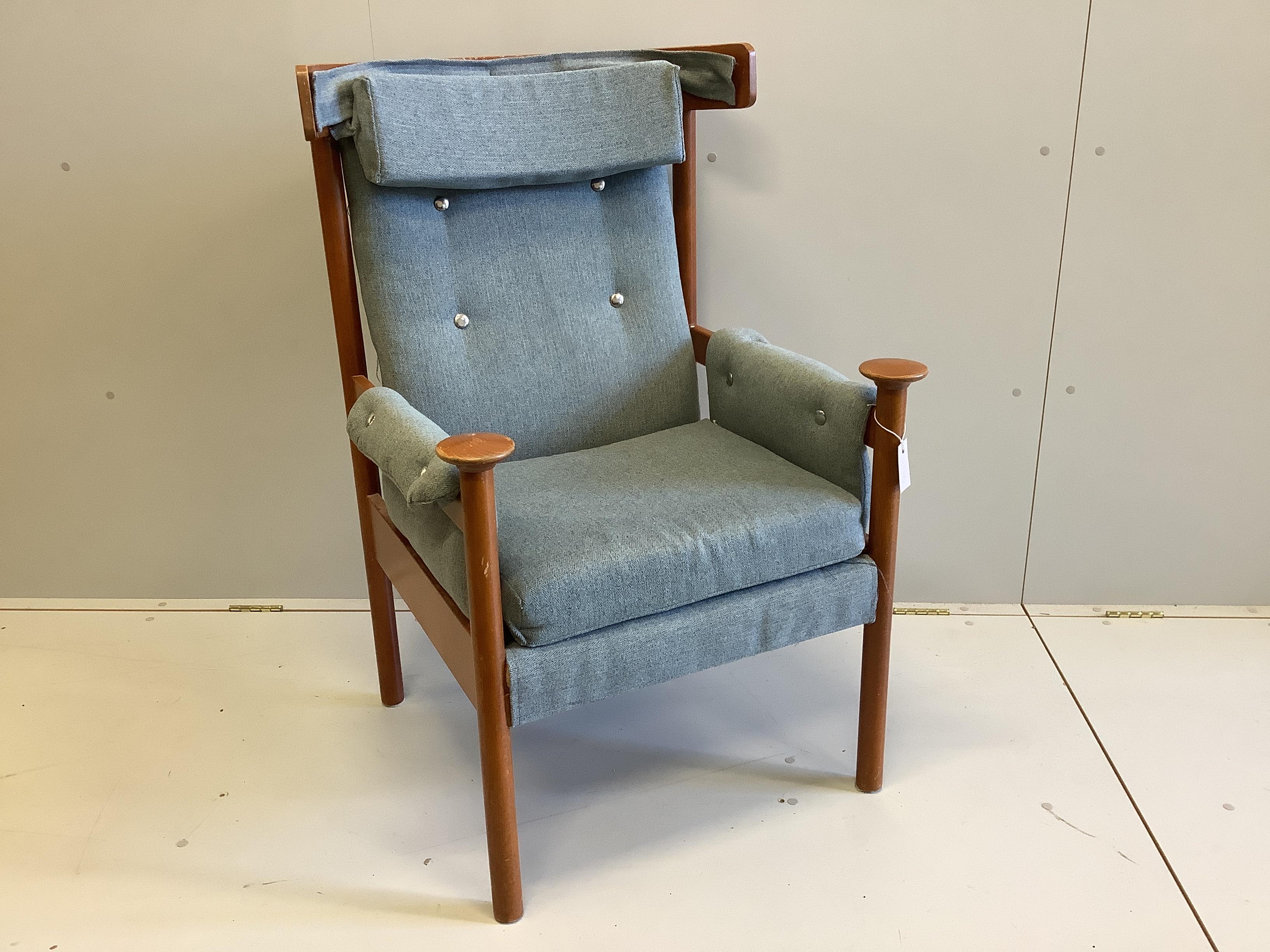 A mid century Parker Knoll upholstered beech “Bwana” style armchair, width 71cm, depth 65cm, height 108cm